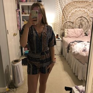 Pink Rose patterned romper.